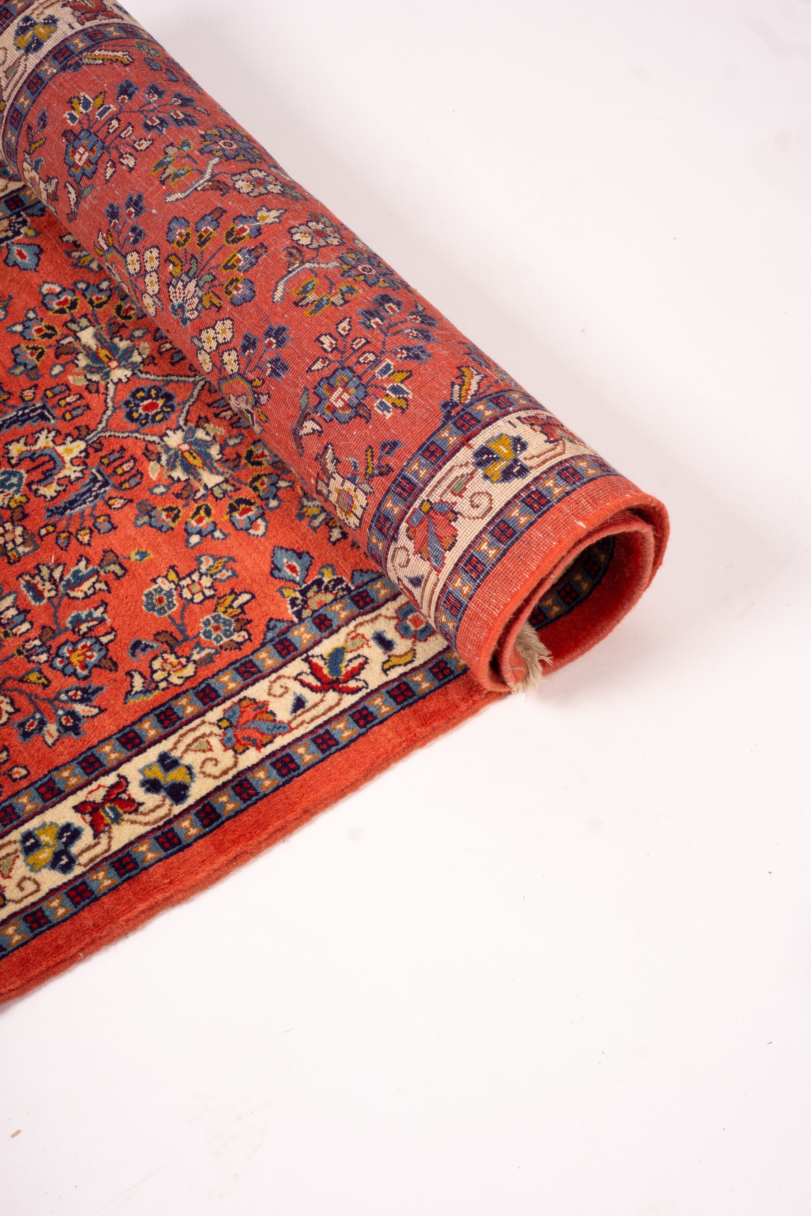 A Persian red ground runner, 202 x 83cm